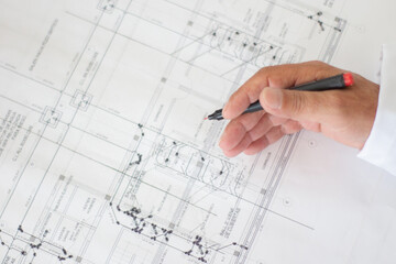 Architect, Engineer, drawing up plumbing and drainage blueprints