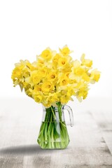Fresh aroma flowers in vase on the desk