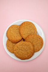 Few homemade cookies on white small dish