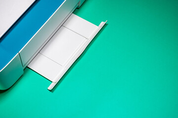 Creative Office: White and Blue Printer on Green Desk with Blank Space