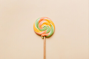 Colorful candies, lollypop on the colorful background, multicolored minimal style top view