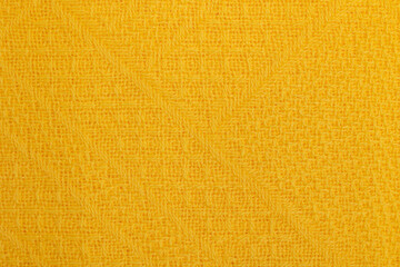 Yellow fabric texture background. Knitted background.
