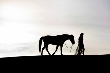 Fototapeta na wymiar Young Female Rider And Her Horse