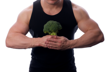 Strong man holding broccoli in front of him transparent PNG