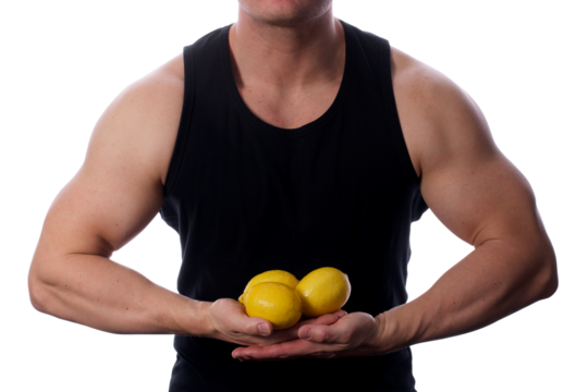 Strong fit muscular male holding lemons in front of him transparent PNG