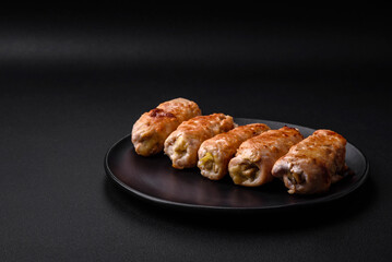 Delicious baked pork or chicken roll with mushrooms, spices and herbs inside