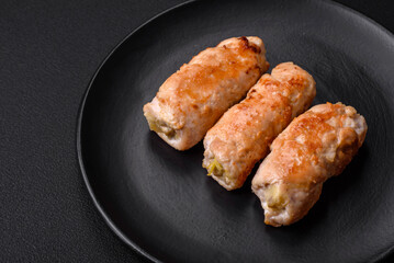 Delicious baked pork or chicken roll with mushrooms, spices and herbs inside
