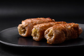 Delicious baked pork or chicken roll with mushrooms, spices and herbs inside