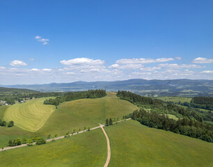 Obraz premium A beautiful summer scenery of Orlicke hory from the hill above the village Mladkov. Eastern Bohemia, Czechia