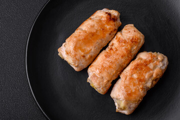 Delicious baked pork or chicken roll with mushrooms, spices and herbs inside