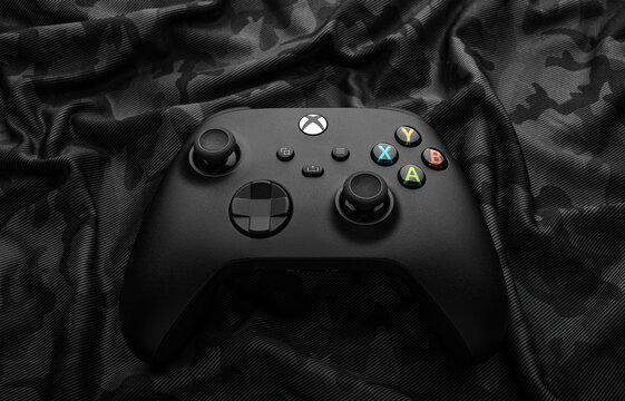 February 22, 2023, Odessa, Ukraine. A black Xbox Wireless Controller. Compatible Xbox Series X|S, Xbox One. Dark camouflage back.