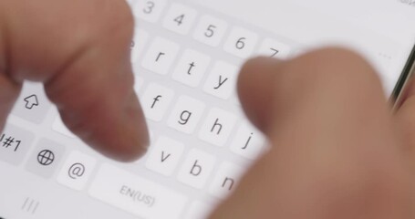 Man typing a text message on his smartphone. Hand of man typing or chat