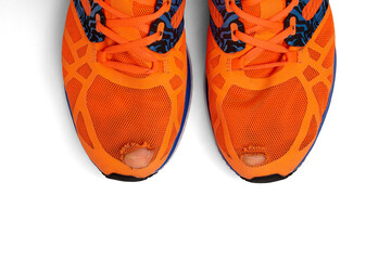 Wanted, leaky sneakers with fingers sticking out of holes. Daily reinforced exercises