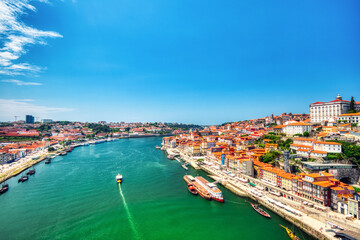 Naklejka na ściany i meble Porto Aerial Cityscape over Douro River during a Sunny Day