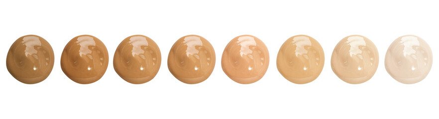 Smears of liquid foundation isolated on white background. Set of different skin tone cream swatches for makeup. 