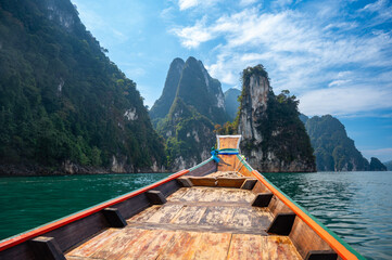 Boat view of epic limestone cliffs at Cheow Lan lake, Khao Sok National Park, Suratthani, Thailand