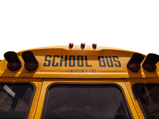 School bus emergency exit sign with cut out sky. © trekandphoto