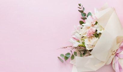 Obraz na płótnie Canvas Beautiful bouquet on pink background