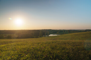Obraz premium Sun and rural landscape at sunset