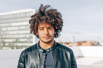 Captivating Gaze - A Stylish and Confident Portrait of a Young North African Man with Strong Cultural Identity and Representation