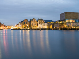 Fototapeta premium Christianshavns harbour buildings lights after sunset, Copenhagen, Denmark