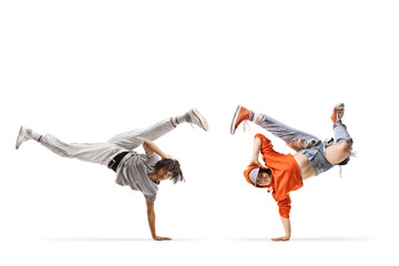 Caucasian female and an african american male performing a handstand