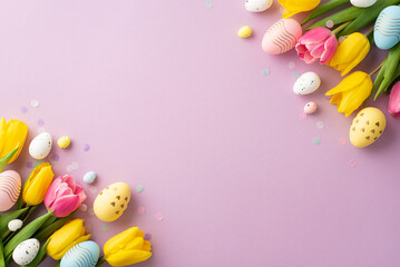 Fototapeta na wymiar Easter celebration concept. Top view photo of spring flowers bouquets of tulips colorful easter eggs and confetti on isolated pastel violet background with empty space