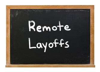Remote layoffs written in white chalk on a black chalkboard isolated on white