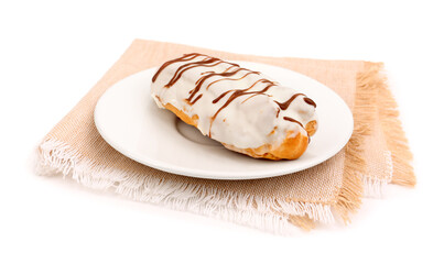 Plate with sweet eclair and napkin isolated on white background