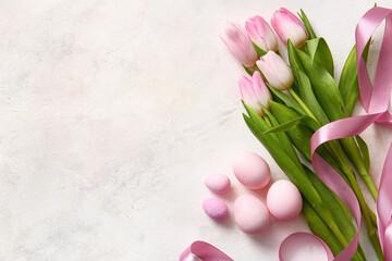 Composition with bouquet of beautiful tulip flowers, painted Easter eggs and ribbon on light background