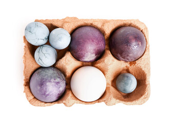 Package with painted Easter eggs isolated on white background