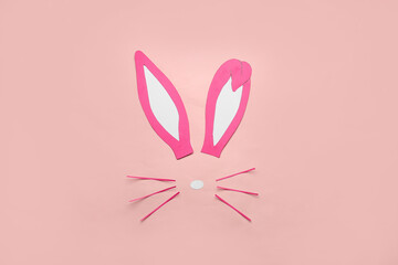 Paper bunny on pink background