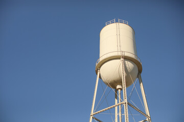 Water tower reserve in the blue sky standing industry 