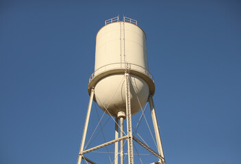 Water tower reserve in the blue sky standing industry 