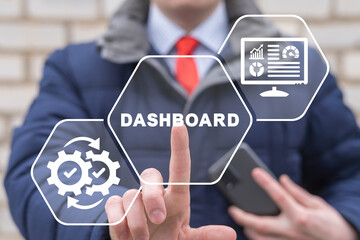 Admin using virtual touchscreen presses word: DASHBOARD. Concept of dashboard. Control panel user interface, UX, KIT, design, UI infographic, data graphic and chart. Administrator analyzes big data.