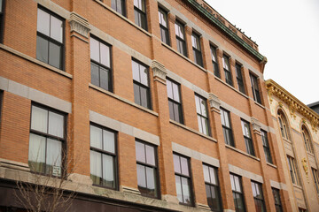 Fototapeta na wymiar old brick building in city historic exterior apartment town 