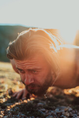 Athlete doing push-ups in the early morning. The concept of a healthy life