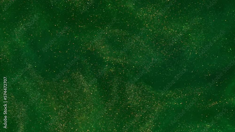 Wall mural abstract detailed gold glitter particles flow with shallow depth of field in green liquid. golden du