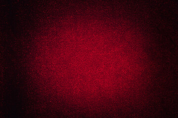 Abstract dark red background with spot lighting for copy space.