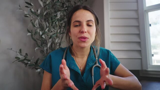 Doctor talking to patient over video call.