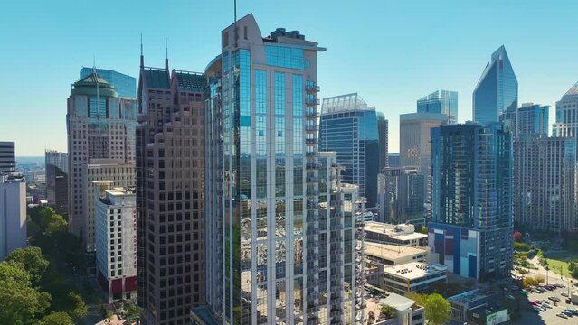 Aerial view of downtown district of Charlotte city in North Carolina, USA. Glass and steel high skyscraper buildings in modern american midtown