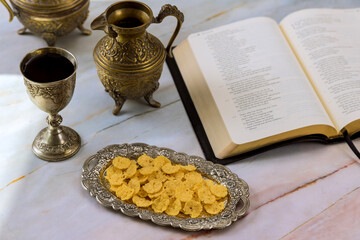 Christian Holy Communion with unleavened bread chalice wine an symbols of Jesus Christ