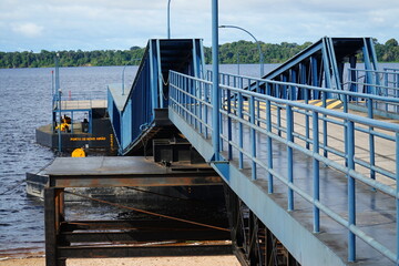 Harbor pontoon that equalizes the highly fluctuating water levels of the Rio Negro river. Porto of...