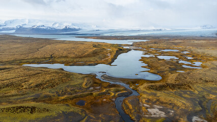 Landscape with mountain and glacier river in Iceland. Beautiful pure nature in north country, Aerial drone view