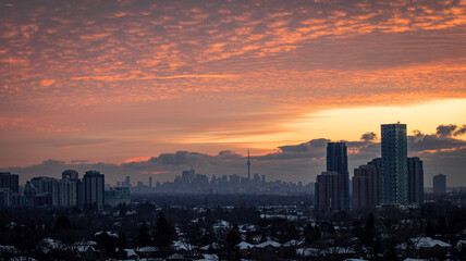 Fototapeta premium Toronto wakes up. Sunrise silhouette of the iconic CN tower.