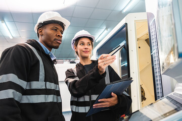 Engineer working in robotics factory