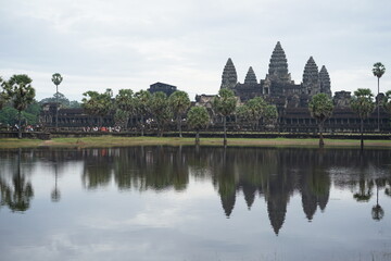 Fototapeta na wymiar Angkor Wat Temple exterior with lake foreground