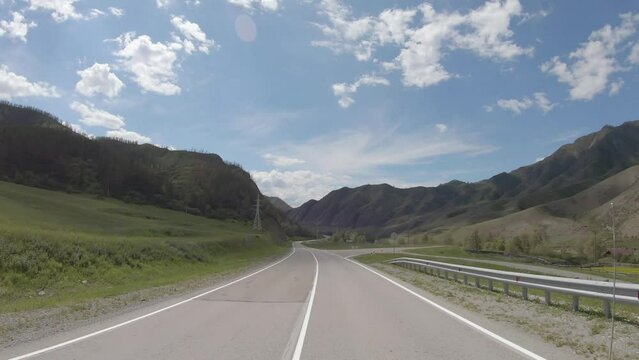Video of driving in a car In summer season along the mountain road in Altai.