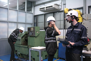 Engineer working in robotics factory