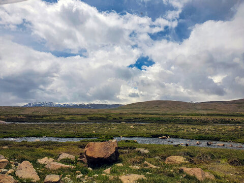 landscape with a wall and clouds